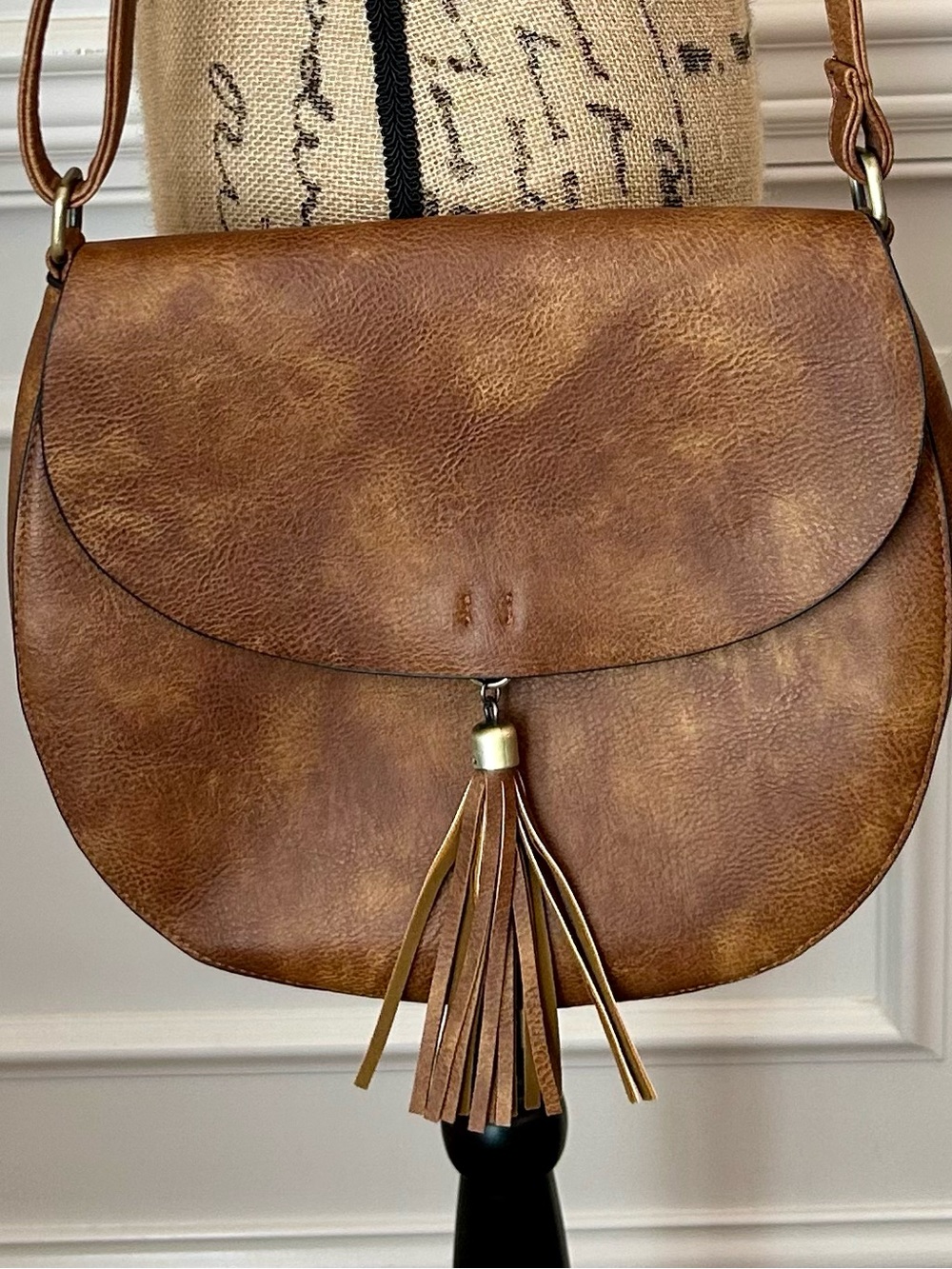 Leather Crossbody Saddle Bag with Tassel